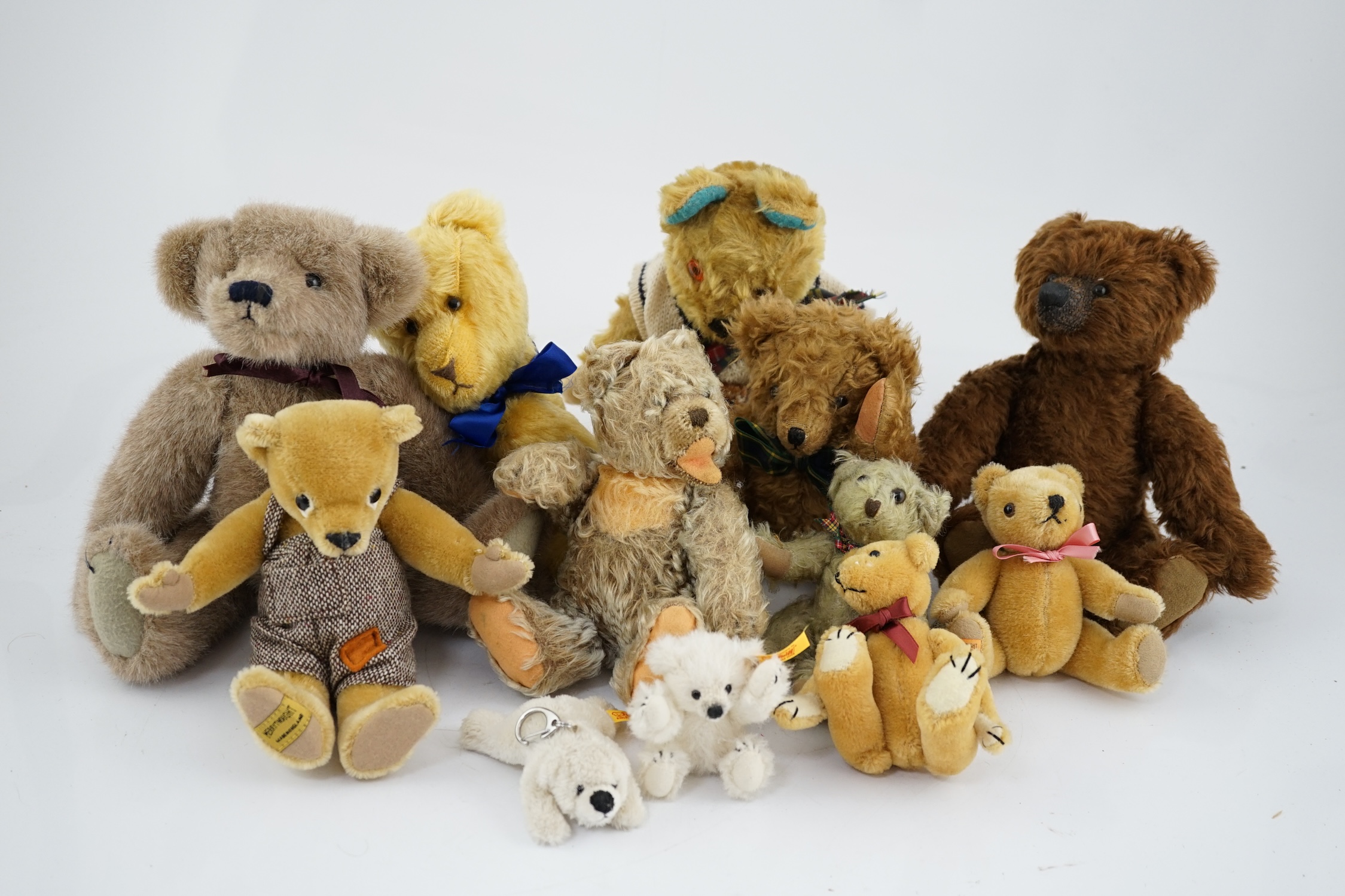 A collection of twenty-six modern teddy bears by The English Teddy Bear Co., Honey Hill Bears, Merrythought, Robin Rive, Steiff, etc.